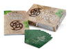 The Māori Oracle by Schiffer Publishing, Ltd. includes a guidebook and Maori-designed box, with green illustrated cards fanned out—offering ancestral guidance and celebrating New Zealand spirituality.