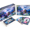 The Magical Dimensions Oracle Cards and Activators by Schiffer Publishing, Ltd. is shown with its box, guidebook, and vibrant affirmation cards featuring mystical celestial art designed for intuitive guidance.