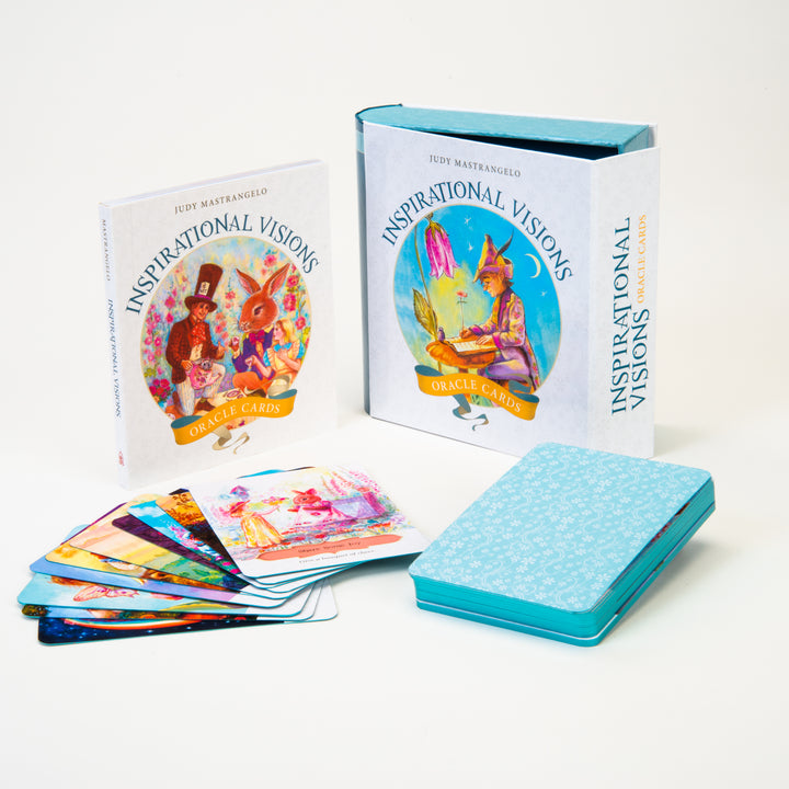 The Inspirational Visions Oracle Cards by Schiffer Publishing, Ltd. includes a guidebook for self-discovery, illustrated cards, and a blue patterned box—all displayed on a white background.