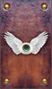 The American Renaissance Tarot by Schiffer Publishing, Ltd. features a central eyeball with white wings on textured brown leather, bordered with brass rivets—evoking Major Arcana symbolism inspired by American literature.