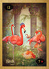 Three pink flamingos stand by stone pillars amid flowers and greenery as sunlight streams through arches. The Lenormand of Enchantment deck by Schiffer Publishing, Ltd. card shows numbers 12, 7, and the word "Birds" in the lower left corner.