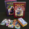 A photo of The Zerner/Farber Tarot by Schiffer Publishing, Ltd. shows the guidebook, decorative box, and several vibrant cards spread out on a black surface—an ideal set for anyone learning tarot.