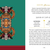 A page from Schiffer Publishing, Ltd.'s Swagatam Tarot shows an ornate gold and red illustration on green, with text about the Queen of Cups card and its cow symbol. The page number, 179, appears at the bottom.