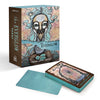 The Everglow by Schiffer Publishing, Ltd. is a tarot deck boxed set featuring mystical blue artwork of a woman’s face. An abstract card is displayed next to the deck, reflecting the divinatory style of this unique tarot collection.