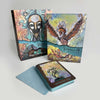 The Everglow by Schiffer Publishing, Ltd. is a divination card set with a deck, guidebook, and box featuring fantasy art—abstract mystical figures and a bird with outstretched wings. One card reads “Opportunity / Risk.”.