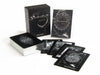 The Nightfall Tarot by Schiffer Publishing, Ltd. is shown with its box, guidebook, a card stack, and five cards fanned out—all featuring dark monochromatic art inspired by the Rider-Waite-Smith Tarot.
