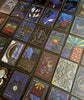 The Shaman’s Way Oracle by Schiffer Publishing, Ltd. is a vibrant shaman oracle deck with intricate animal, symbol, and nature designs displayed in a grid for spiritual healing.