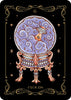 The Nocturnal Garden Lenormand by Schiffer Publishing, Ltd. features its Clouds card: a crystal ball with swirling purple clouds and an orange lightning bolt on a gold and red stand, set against black, with the number 6 at the top.