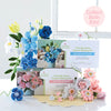 The Bendable Blooms Chenille Stem Flower-Making Kit Cottage Garden by Schiffer Publishing, Ltd. is displayed with sample blooms and a “Collect Both Kits!” label—perfect for creating your own DIY bouquet kit.