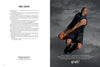 Vince Carter, clad in black basketball gear, leaps and smiles while holding a ball. Against a gray backdrop, white text reads "Milk Mustache" from Schiffer Publishing, Ltd., a classic ad celebrating milk's benefits for athletes.