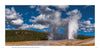 Yellowstone National Park by Schiffer Publishing, Ltd. captures Old Faithful erupting with a soaring steam column under a blue, cloud-dotted sky, surrounded by grasslands and forest—highlighting one of the park’s most iconic geothermal wonders.