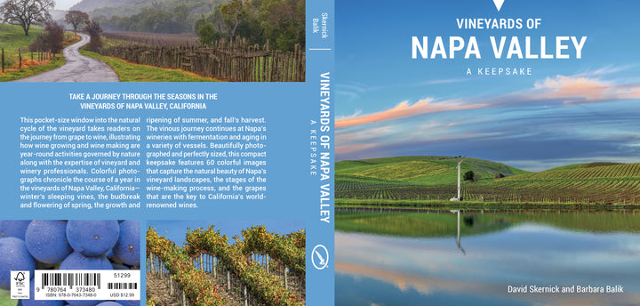 Back cover of the Vineyards of Napa Valley book jacket, featuring photography of rolling Napa Valley vineyards under a sunset sky, with descriptive text, author names, and a barcode.