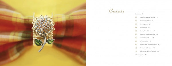 The "Jewelry for Your Table" ring by Schiffer Publishing, Ltd. features a sparkling sunflower shape with green leaf details, displayed on a blurred yellow and plaid background beside a table of contents on a white page.