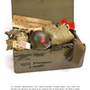 The M-1 Helmet of the World War II GI by Schiffer Publishing, Ltd. showcases GI gear: a helmet, uniform, belt, gloves, a name stencil for Lt. H.S. Vanbenthuyseyn, a folded American flag, and a Nazi armband, evoking authentic combat history.