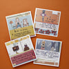 Four illustrated cards with witty, motivational quotes from "Today's Top Stationery Artists" by Schiffer Publishing, Ltd. are displayed on an orange surface, each with unique characters and creative decorative elements beneath typed text.