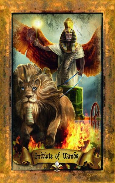 A pharaoh in Egyptian garb stands in a chariot wielding a glowing wand, with a blue-maned lion by his side amid red wings and flames. "Initiate of Wands" appears on the card from The Illuminati Tarot by Schiffer Publishing, Ltd.