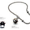 On Body and Soul by Schiffer Publishing, Ltd. is a striking necklace with a black ball and spikes, channeling protective jewelry vibes and making a bold, armor-inspired statement.