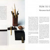 An open book spread from "An Introduction to Chinese Calligraphy" by Schiffer Publishing, Ltd. shows calligraphy tools—brushes, ink stone, teapot, and paper—on the left and "How to Start" text with a desk illustration on the right.