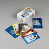 Today's Journey Tarot by Schiffer Publishing, Ltd. is shown on a gray surface with the vibrant deck, cards face up, and a blue guidebook—ideal for exploring spiritual insights through vivid illustrations.