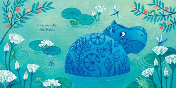 A blue hippo with floral patterns peeks from a pond of lily pads, frogs, dragonflies, and white flowers. Inspired by an Egyptian hippo from the Louvre. "Hide-and-Seek with Little Hippo" by Schiffer Publishing, Ltd. Text: Look carefully, Little Hippo!.