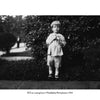 A black and white photo of a young boy on a sidewalk, hands together, with bushes behind him, from The Clay Pigeons by Schiffer Publishing, Ltd. Caption: Future B-17 pilot RCS as a boy, Philadelphia, c. 1924.