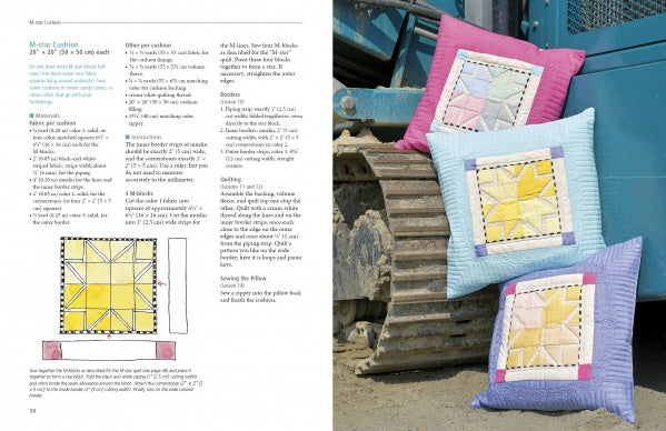 Three colorful patchwork cushions rest on construction equipment tracks, beside Schiffer Publishing, Ltd.'s "Play-of-Color Quilting," an open book with instructions and diagrams for geometric quilts and freestyle color piecing.