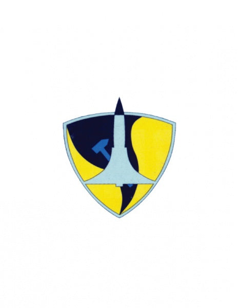 The "Hammers" emblem from Schiffer Publishing, Ltd. features a shield with a stylized rocket, yellow and dark blue sections, and a subtle hammer and sickle, inspired by the Israeli Air Force 69 Squadron.