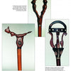 A page from "Sculpting Cane Handles" by Schiffer Publishing, Ltd. displays three ornate wood handles: a curved dark top handle with ring collar, a female nude on the bottom left, and a decorative metal-accented handle on the right.