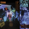 A house decked out for Halloween with giant webs, glowing lights, and spooky displays—like in "Best of How to Haunt Your House, Volume II" by Schiffer Publishing, Ltd.—features a "Beware of Spiders!" sign welcoming guests at the walkway.