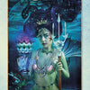 A mystical mermaid with flowing dark hair holds a glowing cup with lotus and trident, symbolizing love, intuition, and healing in the Tarot of the Enchanted Soul deck by Schiffer Publishing, Ltd.