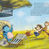 In “The Grumbletroll . . . Wants to Be First!” by Schiffer Publishing, Ltd., a blue Grumbletroll lounges with friends on a picnic in colorful nature beside a treehouse. Text appears on the right, capturing a scene of cheerful sportsmanship.