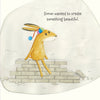 A rabbit in a colorful pom-pom hat sits on bricks. The text reads: Simon dreamed of making something beautiful—like in "The Tree in My Tuba" by Schiffer Publishing, Ltd., where music and nature spark every adventure.