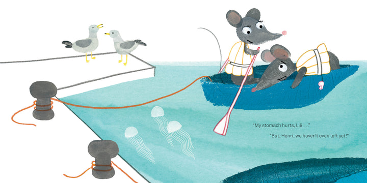 In "Lili at the Beach" by Schiffer Publishing, Ltd., two mice in life vests float in a blue boat at the dock—one paddling, one ill. Whimsical fingerprint art details seagulls watching above and jellyfish swimming below.