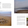A magazine spread features photos from "Land Art" by Schiffer Publishing, Ltd., depicting pebbled beaches, cliffs, and natural art on sand, with text exploring nature art and personal connections to place.